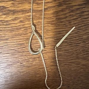 Kendra Scott long necklace.